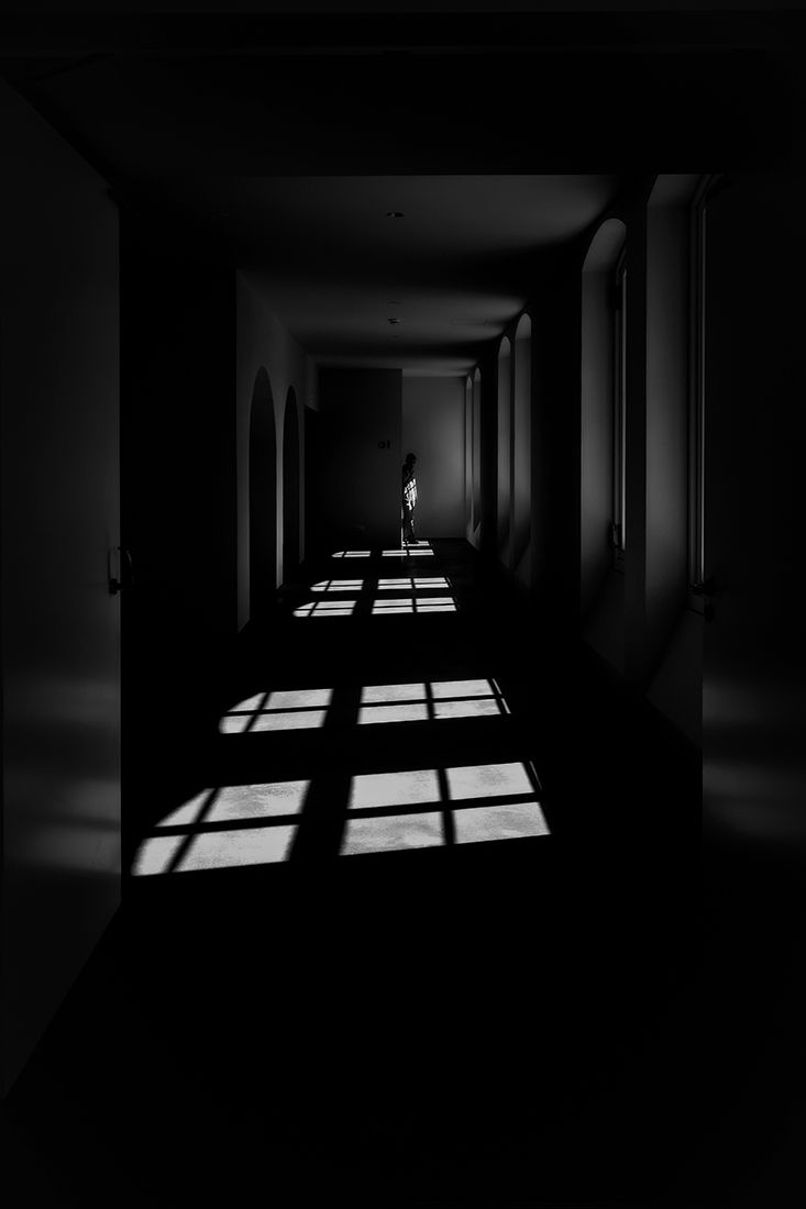 Man at the end of the corridor