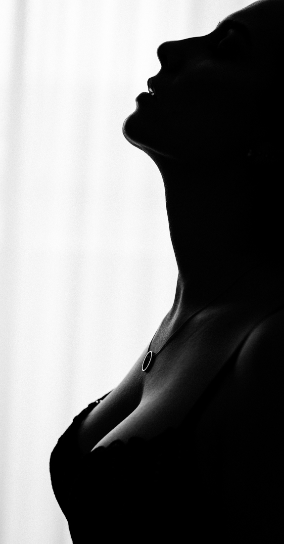 T.
