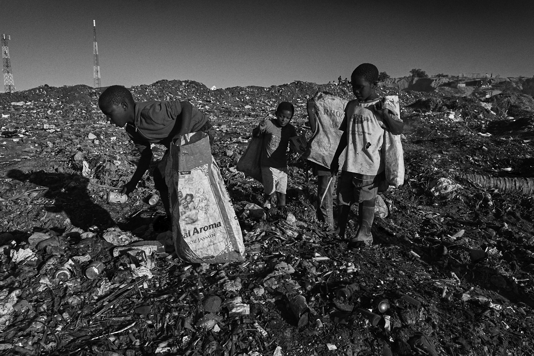 Behind the trash
