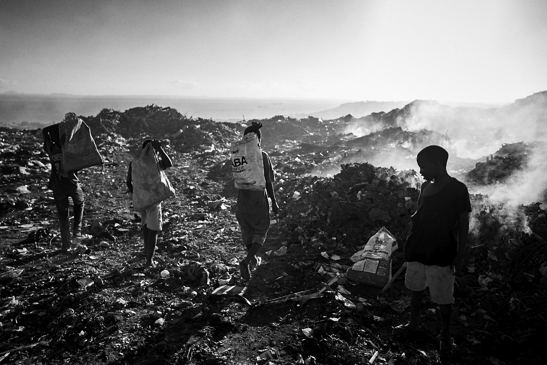 Behind the trash