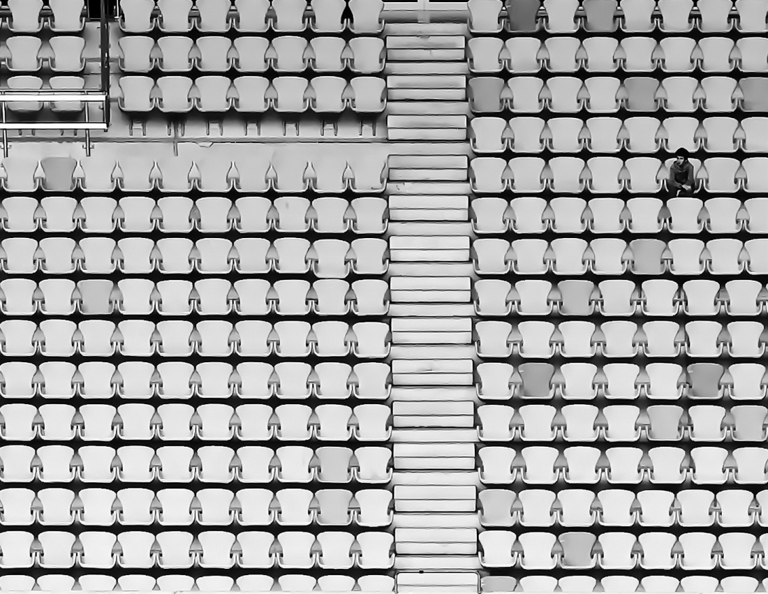 The lonely boy in the big stadium