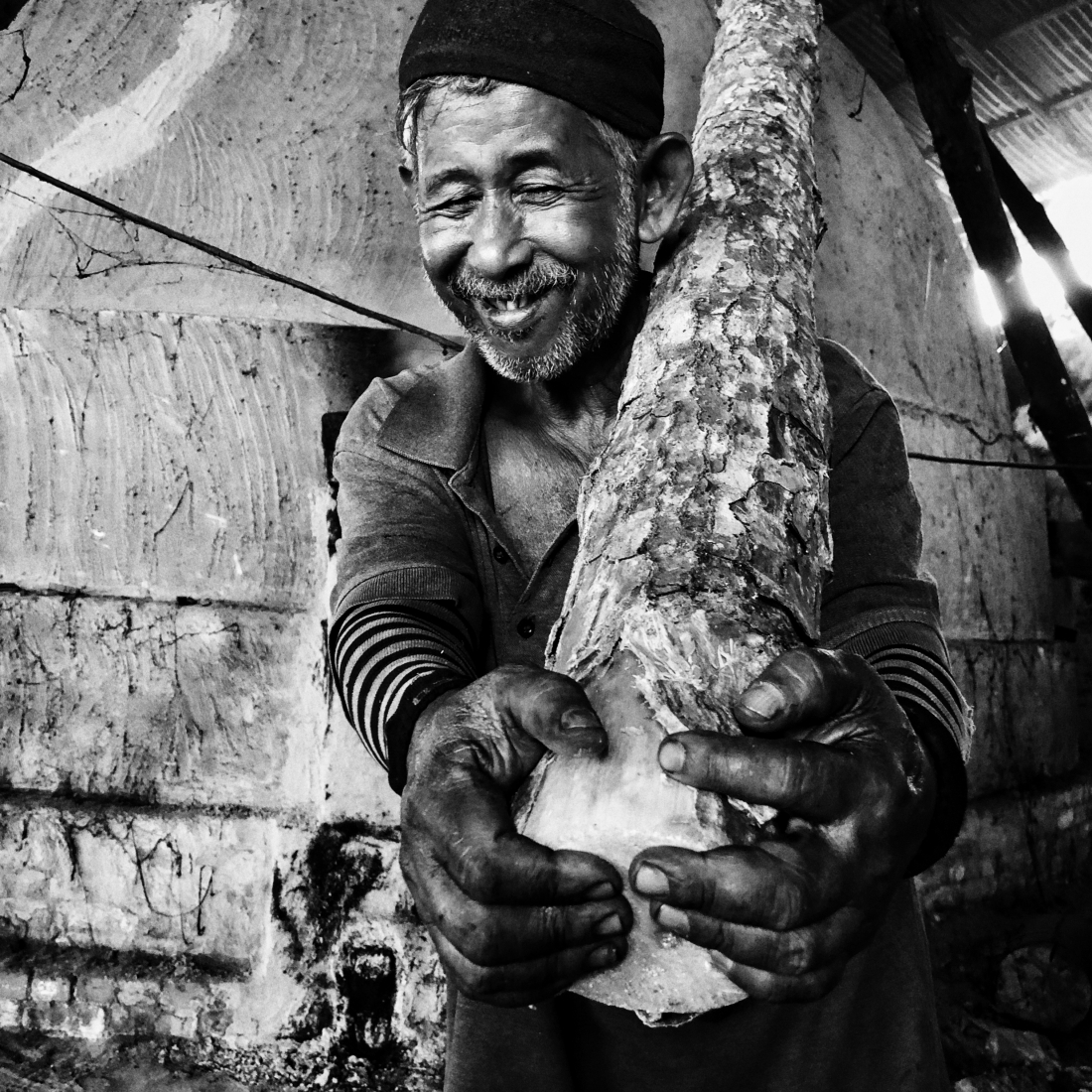 Man with log