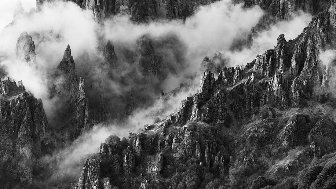 On The Crest Of A Mountain, Behind The Clouds