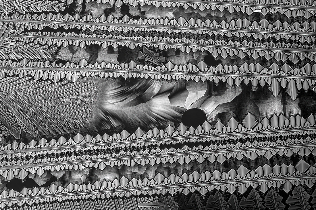 Microcrystals - a crossover between art and science, a melting of urea and paracetamol in polarized light.
