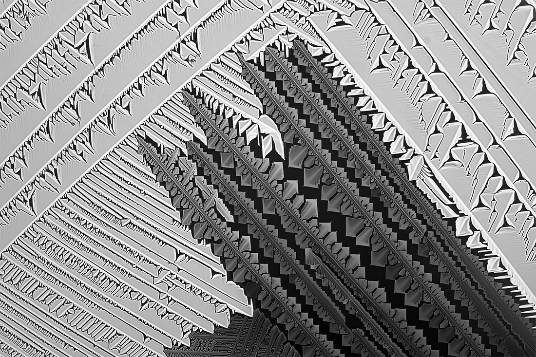 Microcrystals - a crossover between art and science, a melting of urea and paracetamol in polarized light.