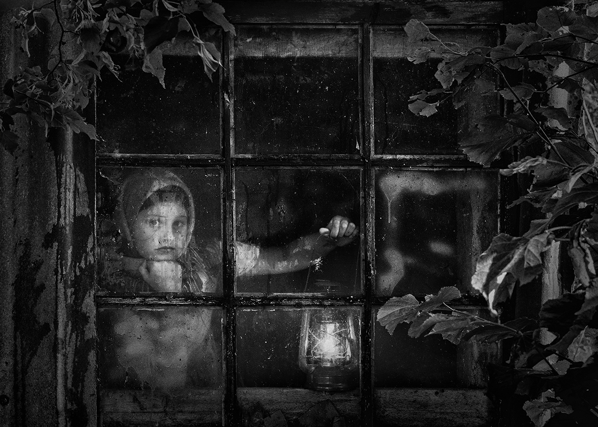 At the window
