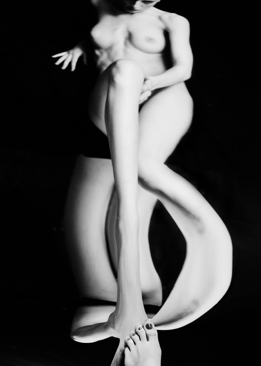 Beauty Distorted: A Cosmic Reflection on Warped Aesthetics.