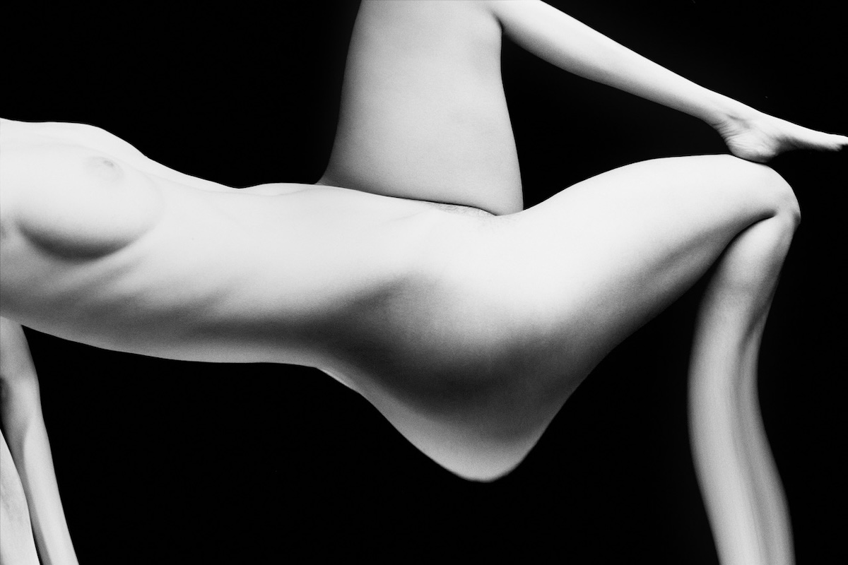 Beauty Distorted: A Cosmic Reflection on Warped Aesthetics.