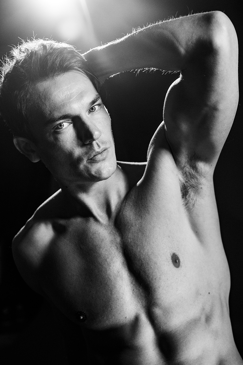 Portraits of male model in my studio in hard light