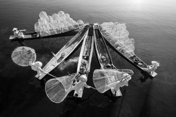 Leg-Rowing Fishermen